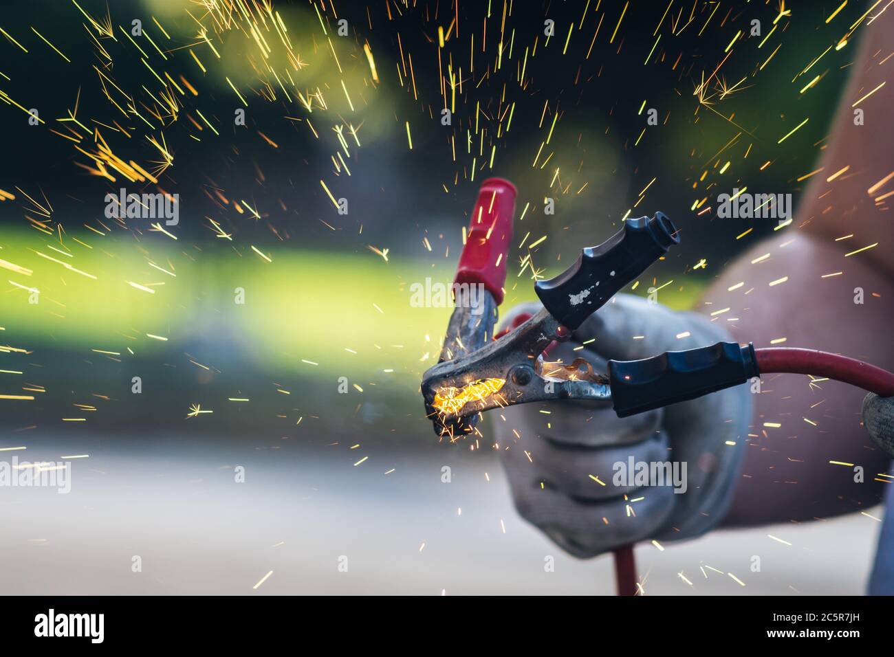 Sparks from car battery connection Stock Photo Alamy