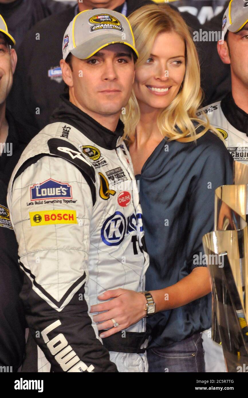 Homestead, United States Of America. 16th Nov, 2008. HOMESTEAD, FL - NOVEMBER 16: (L-R) Jimmie Johnson, driver of the #48 Lowe's/Kobalt Tools Chevrolet, and his wife Chandra pose on stage after winning the 2008 NASCAR Sprint Cup Series Championship after the Ford 400 at Homestead-Miami Speedway on November 16, 2008 in Homestead, Florida People: Jimmie Johnson, Chandra Johnson Credit: Storms Media Group/Alamy Live News Stock Photo