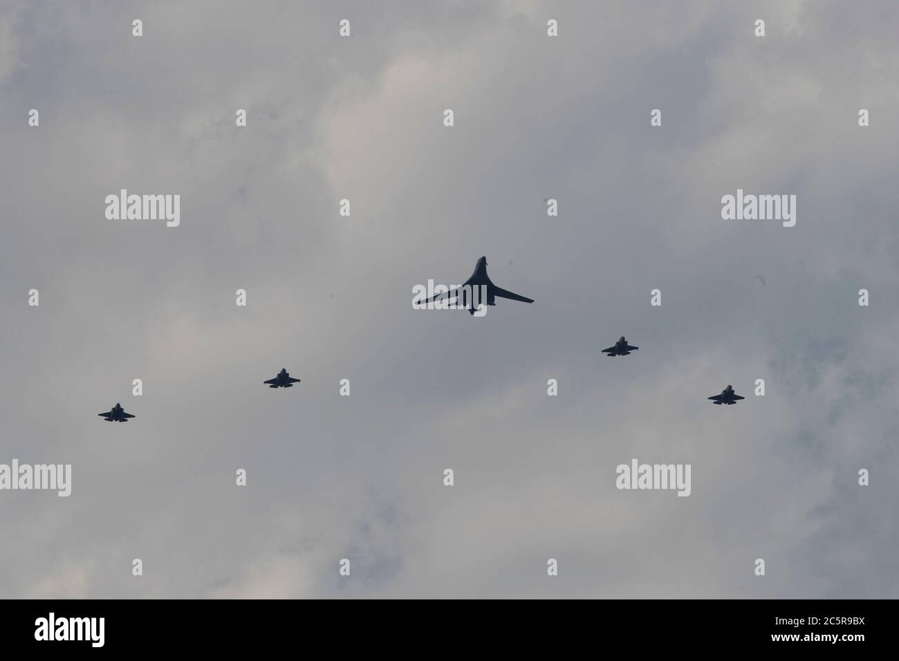 Jersey City, New Jersey, USA. 4th July, 2020. In a 'Salute to America'' on the Fourth of July, a group of U.S. Air Force and U.S. Marine Corps planes ''” including a B-52 bomber fly over the Hudson River in New York.The aircraft included U.S. Air Force Thunderbirds, followed by B-1, B-2 and B-52 bombers, F-15 and F-22 fighters and U.S. Marine Corps F-35 fighters.Â The Flyover cities included Boston, New York, Philadelphia, and Baltimore. Credit: Brian Branch Price/ZUMA Wire/Alamy Live News Stock Photo