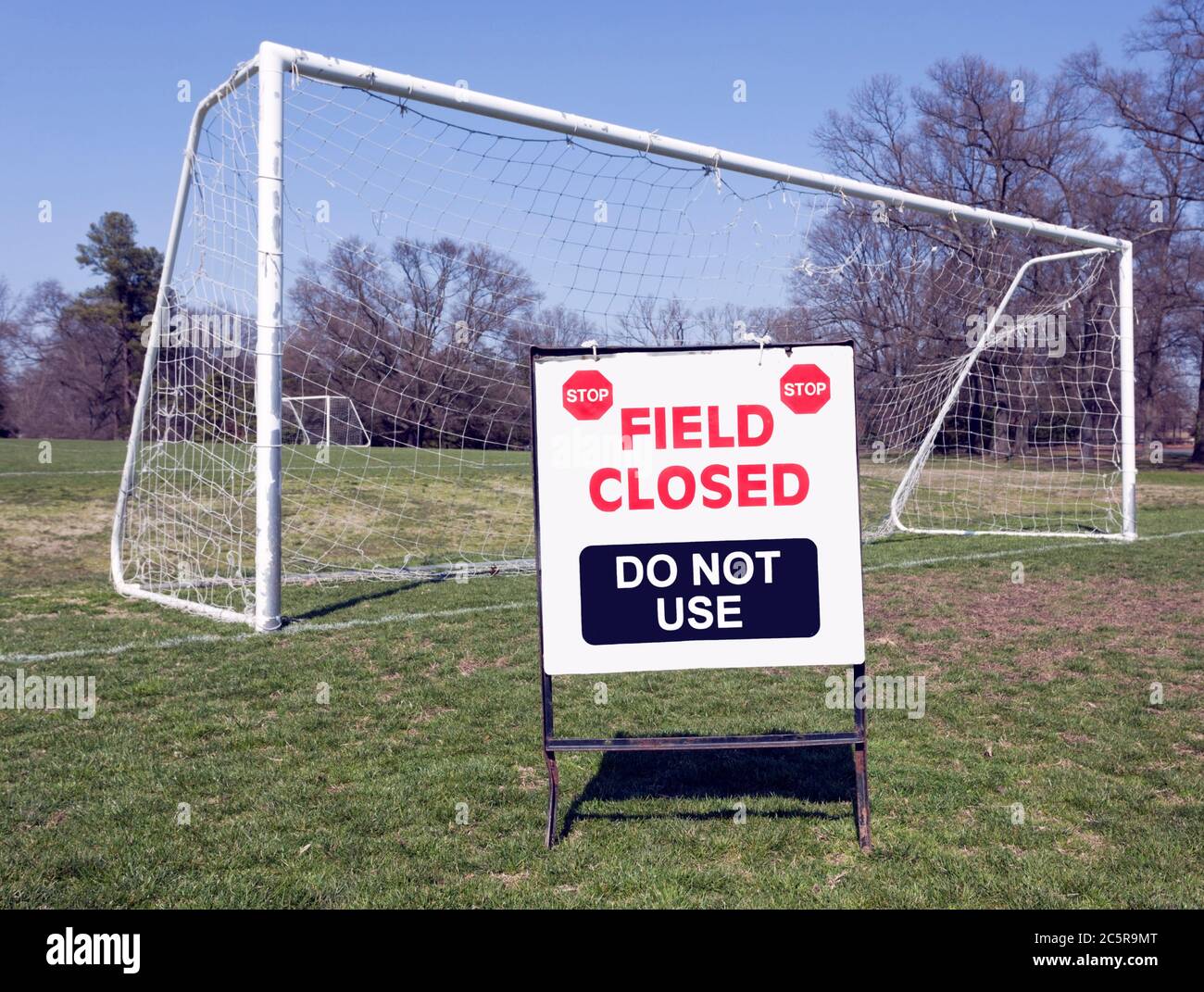 Soccer field closed sign with soccer net in background. Horizontal. Stock Photo