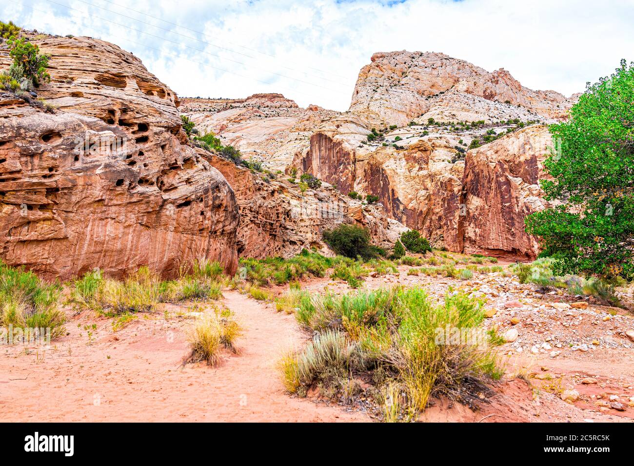 Red orange rock formations landscape view near grand wash parking area in summer in Capitol Reef National Monument in Utah Stock Photo