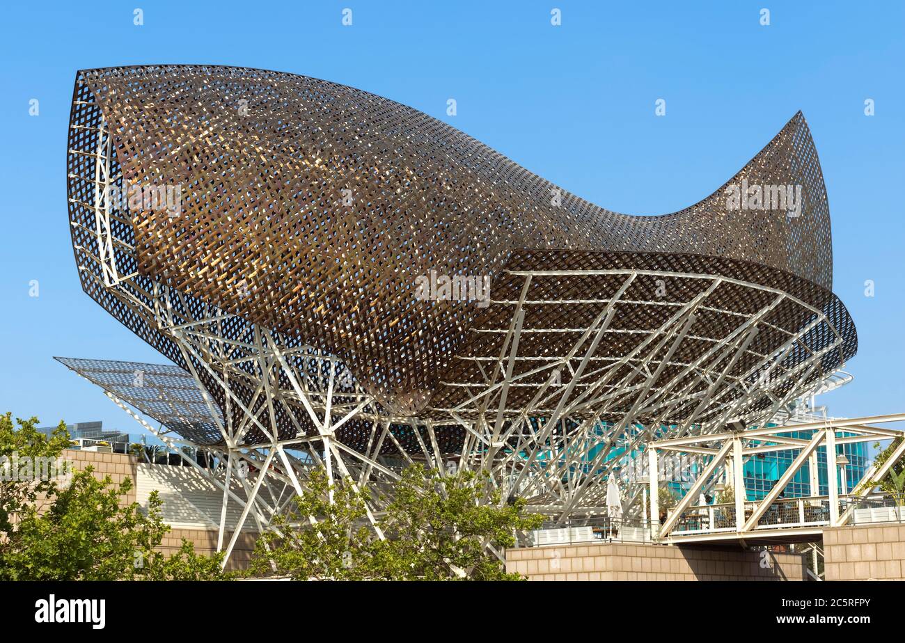 BARCELONA, SPAIN - JULY 12, 2015: Frank Gehry's modern El Peix d'Or sculpture is located in Barcelona's Vila Olimpica, Olympic Village for the 1992 Ol Stock Photo
