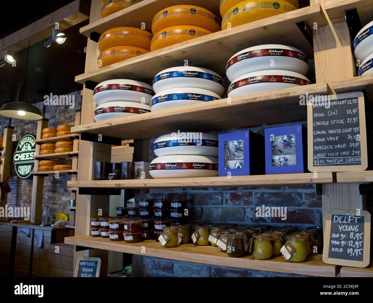 AMSTERDAM, NETHERLANDS MAY 30 Whole Dutch cheeses fill the shelves