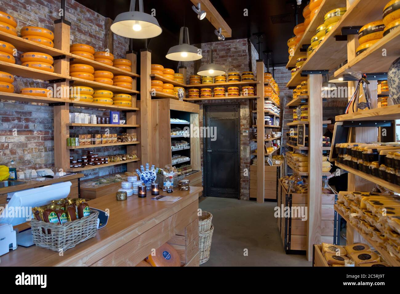 AMSTERDAM, NETHERLANDS MAY 30 Whole Dutch cheeses fill the shelves