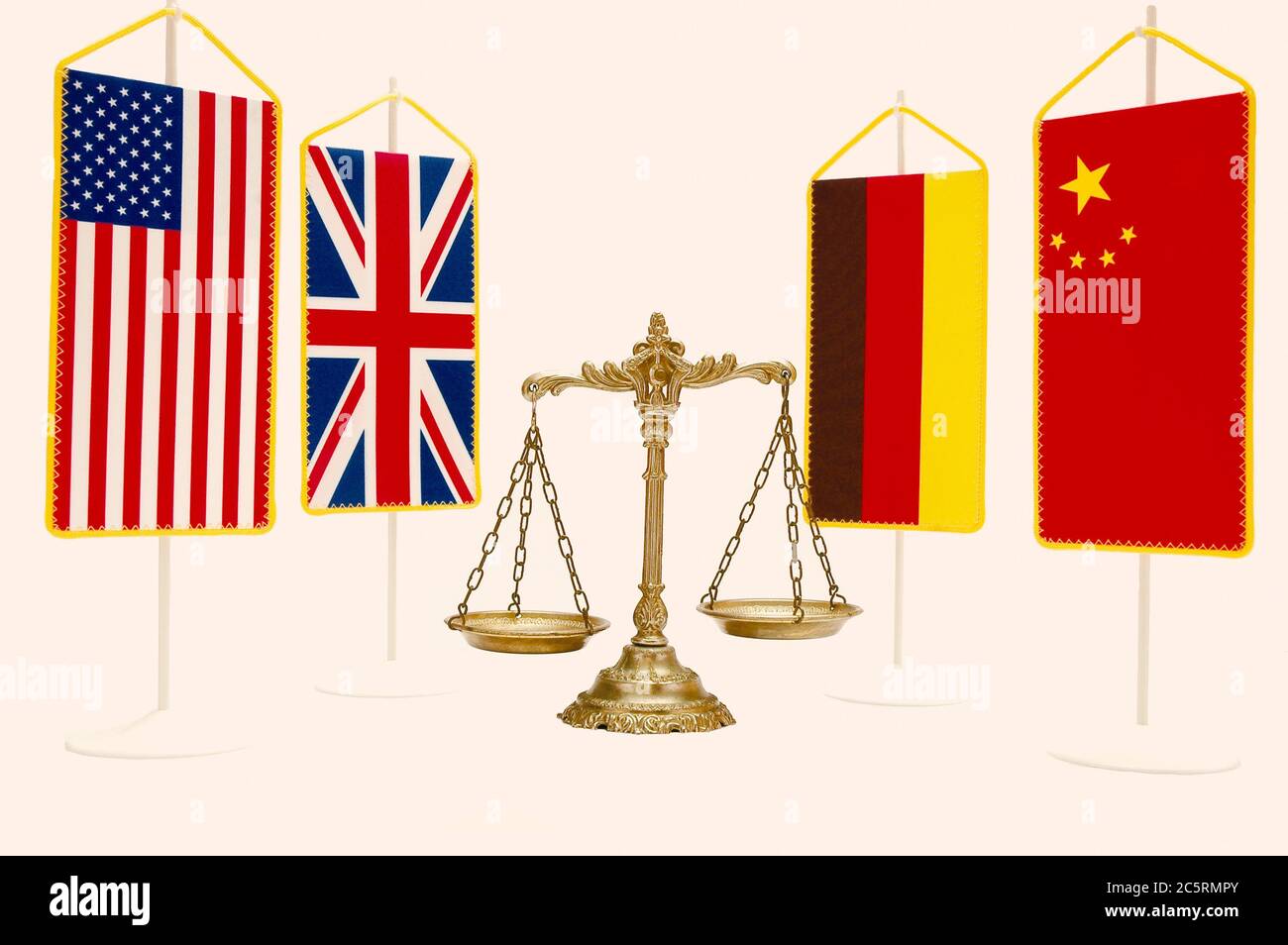 Decorative Scales of Justice with National flag of United States of America, United Kingdom, China and Germany Stock Photo