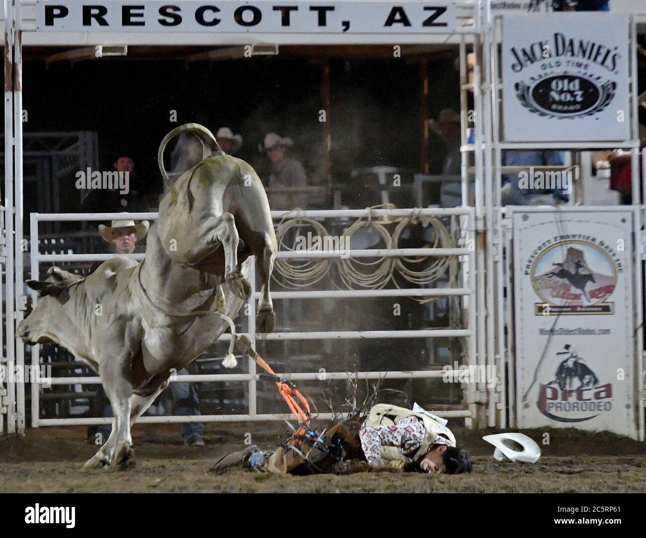 Prescott, AZ, USA. 3rd July, 2020. Jesse Flores, from Valinda, California, goes face first into the dirt as he competes in the Bull Riding event during the 133rd Prescott Frontier Days Rodeo in Prescott, Arizona Friday July 3, 2020. The rodeo, the longest running in the world, continued on despite the coronavirus pandemic with fan capacity limited to 25 percent at the venue. Credit: Will Lester/ZUMA Wire/Alamy Live News Stock Photo