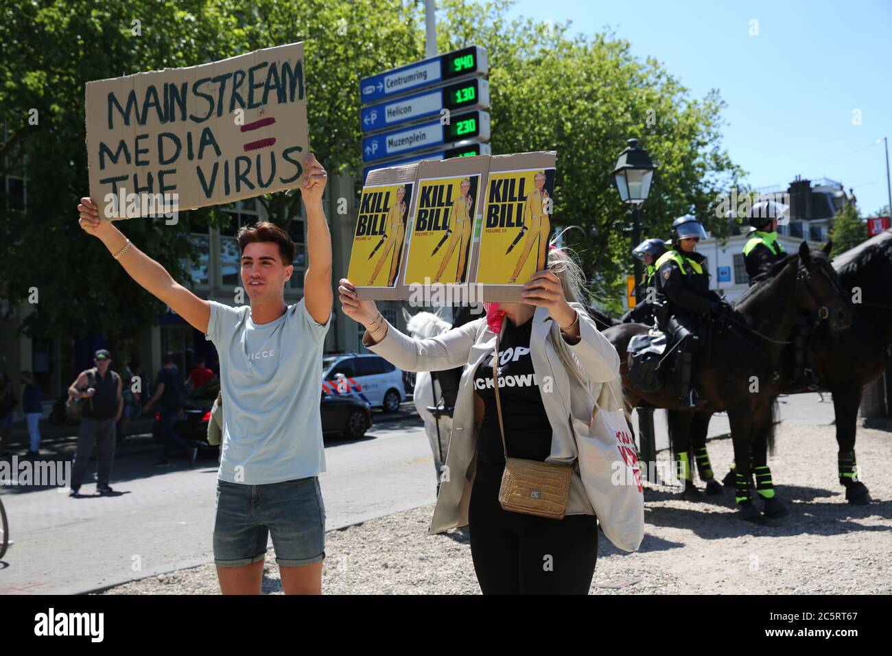 The Hague police arrest 37 for breaking rules at an anti-lockdown protest during the Covid-19 pandemic. Demonstrators who did not respect the 1.5 m distance maximum rule were targeted by riot police Featuring: Atmosphere Where: The Hague, Netherlands When: 30 May 2020 Credit: WENN.com Stock Photo