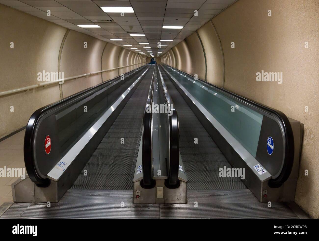 MONTE CARLO, MONACO - APRIL 28: One of more pedestrian tunnels with escalators on April 28, 2013 in Monte Carlo, Monaco. They connect the different pa Stock Photo