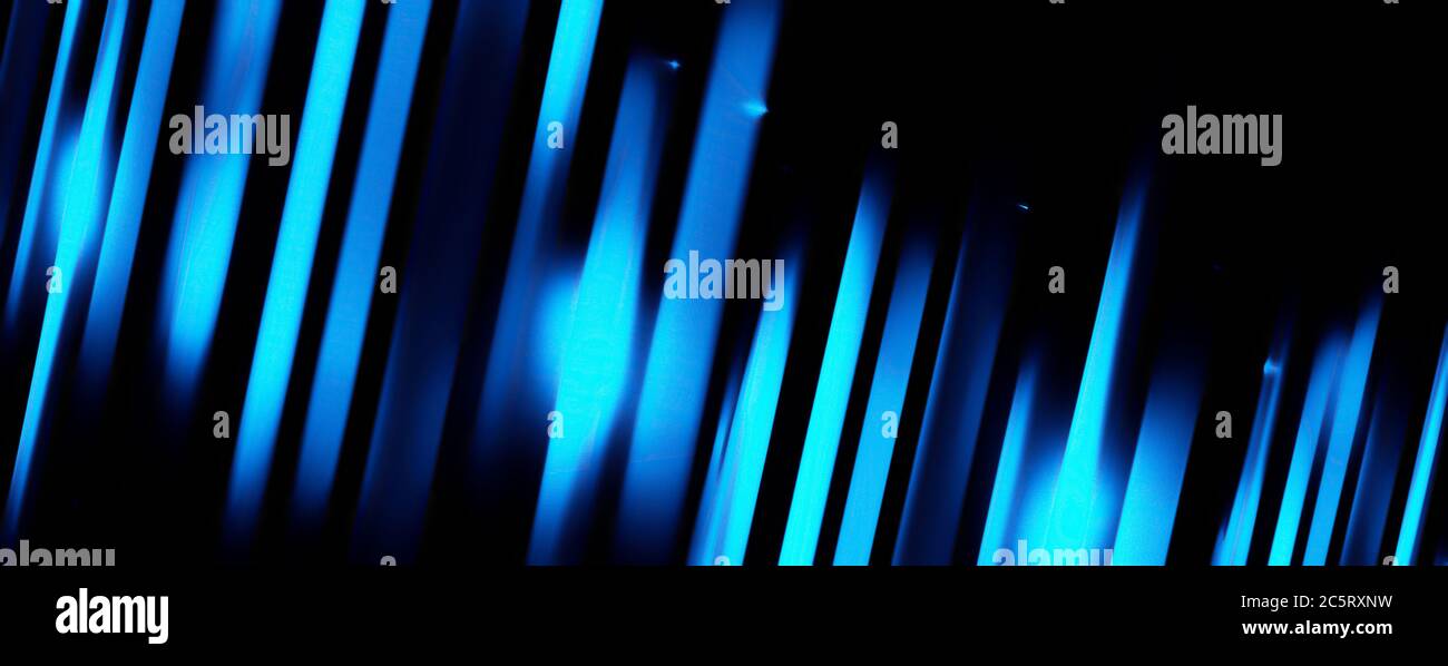 Panoramic glowing blurred light stripes in motion over on abstract ...