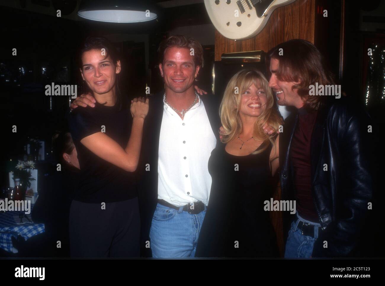 Los Angeles, California, USA 4th December 1995 (L-R) Actress Angie Harmon, actor David Chokachi, actress Donna D'Errico and actor Jaason Simmons attend event at Hard Rock Cafe on December 4, 1995 in Los Angeles, California, USA. Photo by Barry King/Alamy Stock Photo Stock Photo