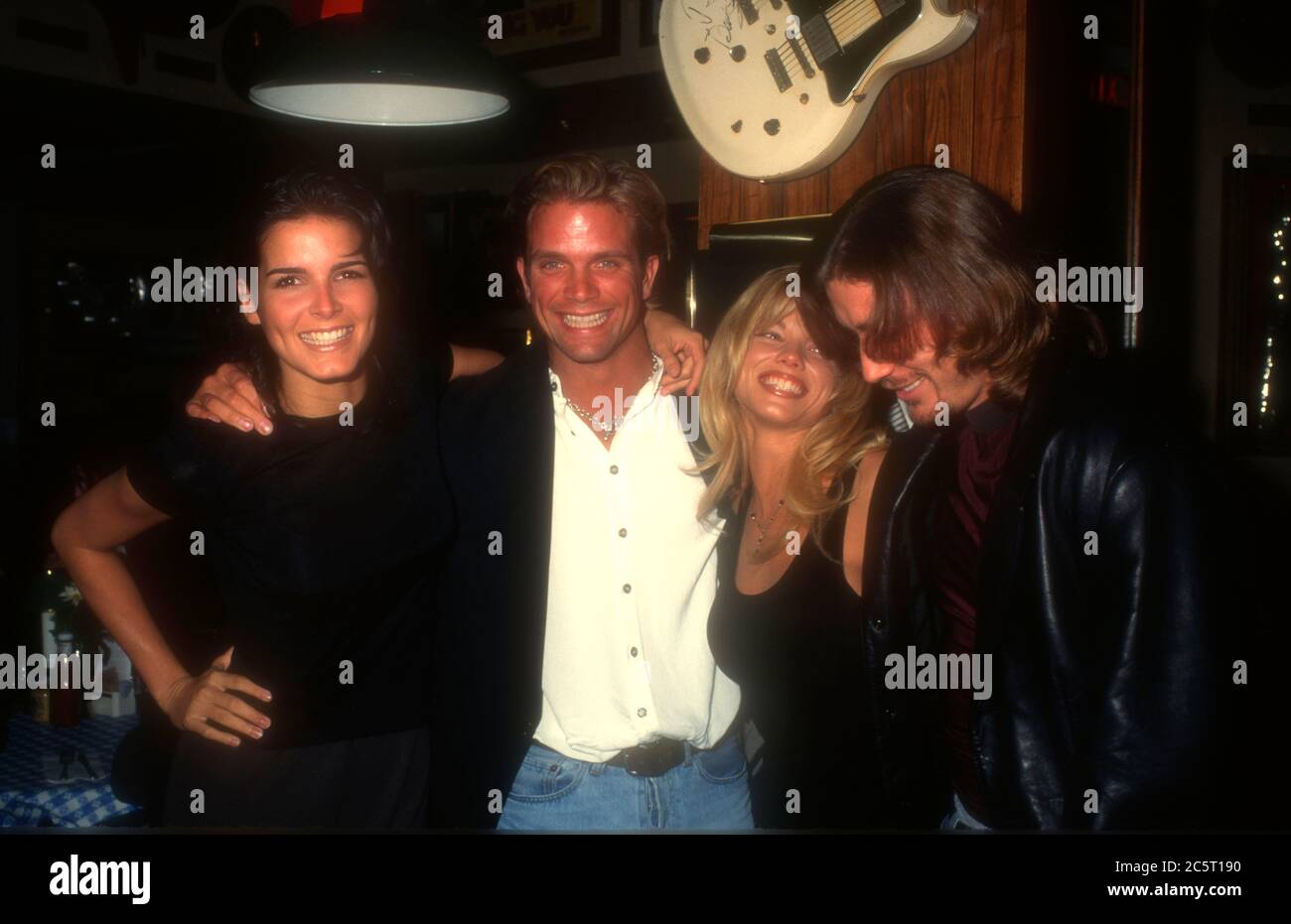 Los Angeles, California, USA 4th December 1995 (L-R) Actress Angie Harmon, actor David Chokachi, actress Donna D'Errico and actor Jaason Simmons attend event at Hard Rock Cafe on December 4, 1995 in Los Angeles, California, USA. Photo by Barry King/Alamy Stock Photo Stock Photo