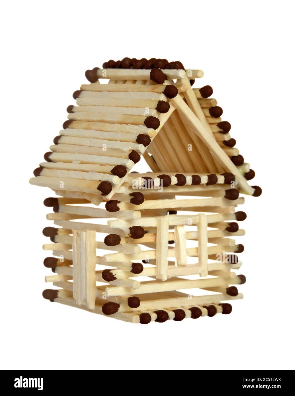 Log house from matches pattern isolated on white. Clipping path included. Stock Photo