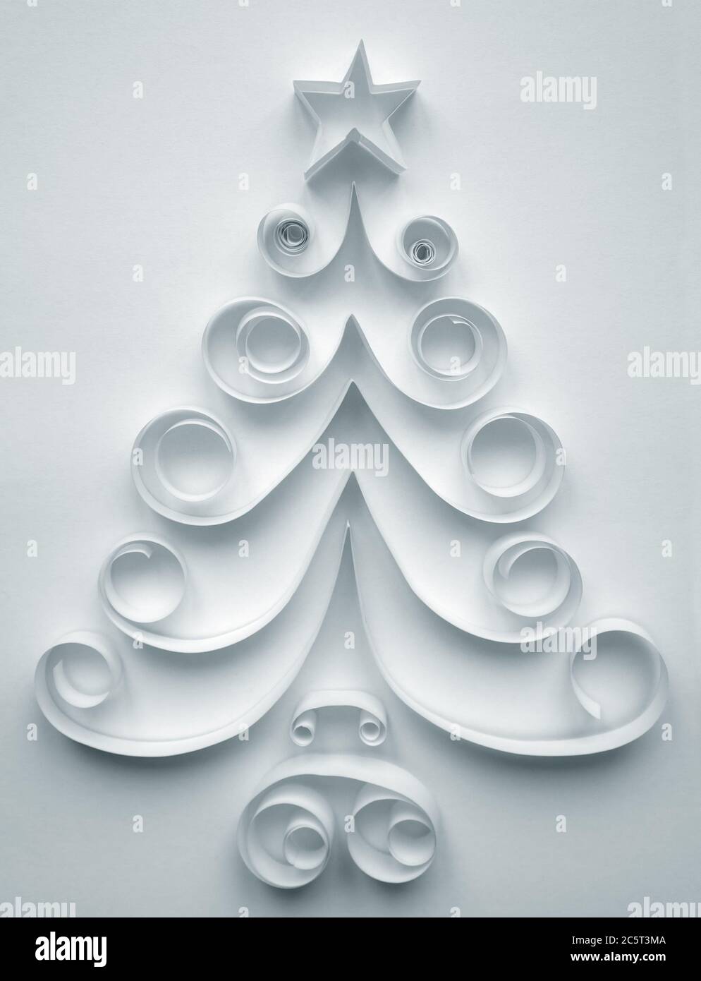 Christmas tree made of paper on white background Stock Photo - Alamy