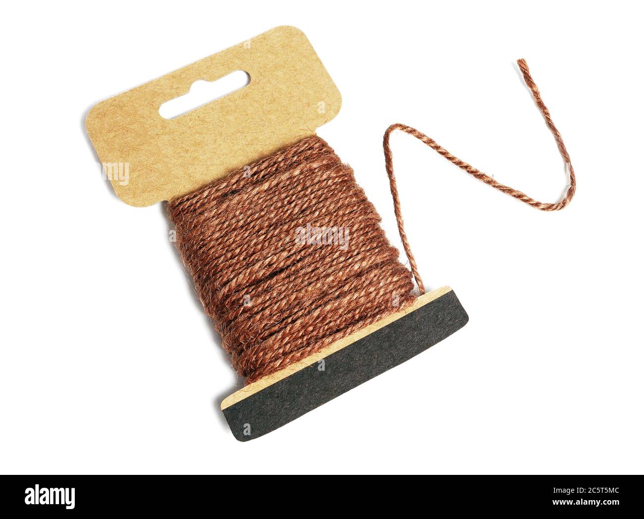 Hemp Rope Wound Up on Card With Loose End on white Background Stock Photo