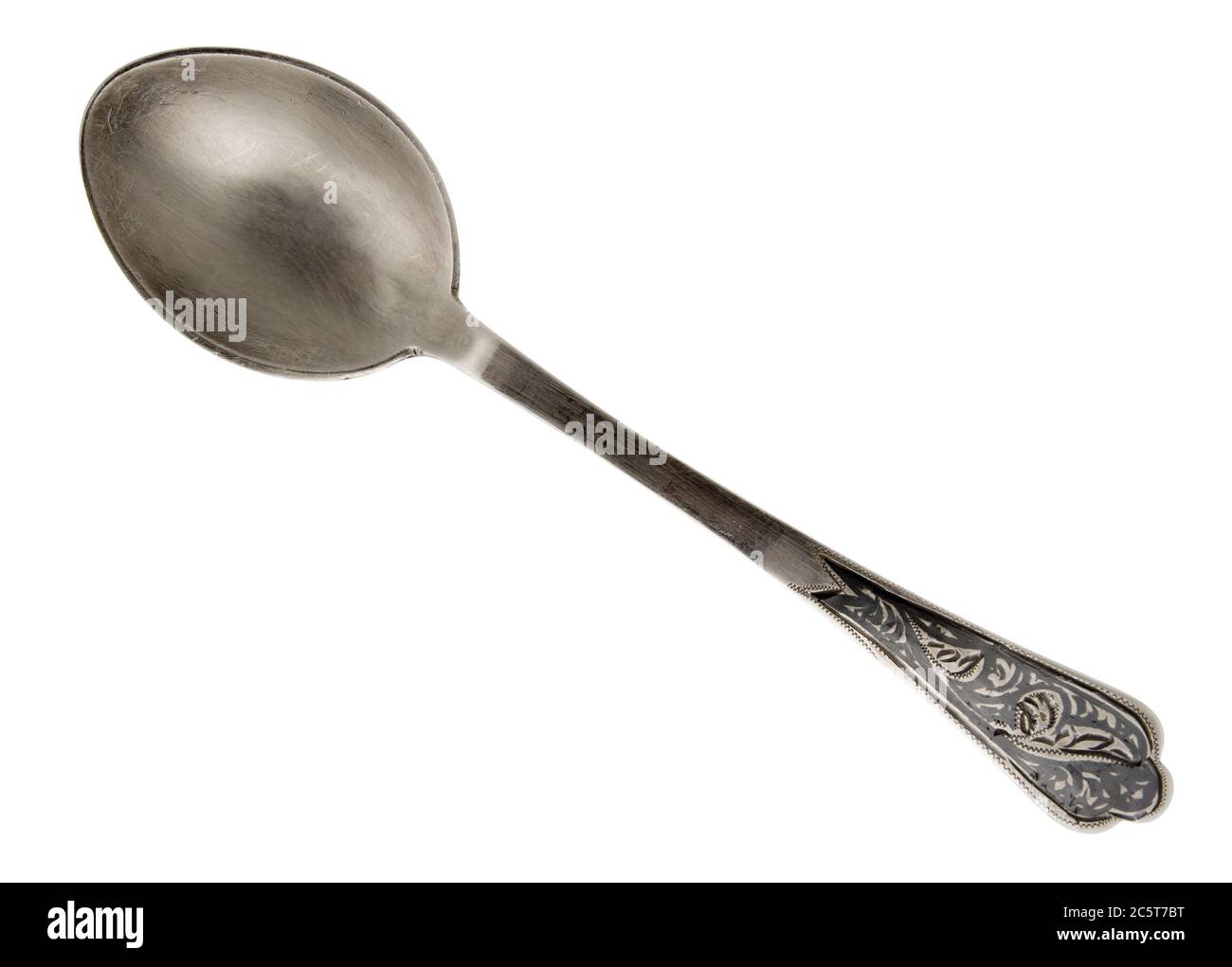Old silver spoon with ornament isolated on white. Clipping path included Stock Photo Alamy