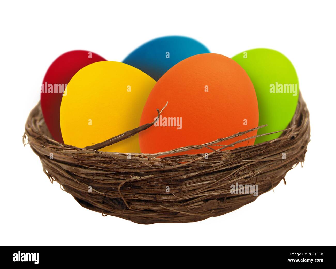 Eggs in a nest isolated on white background Stock Photo - Alamy