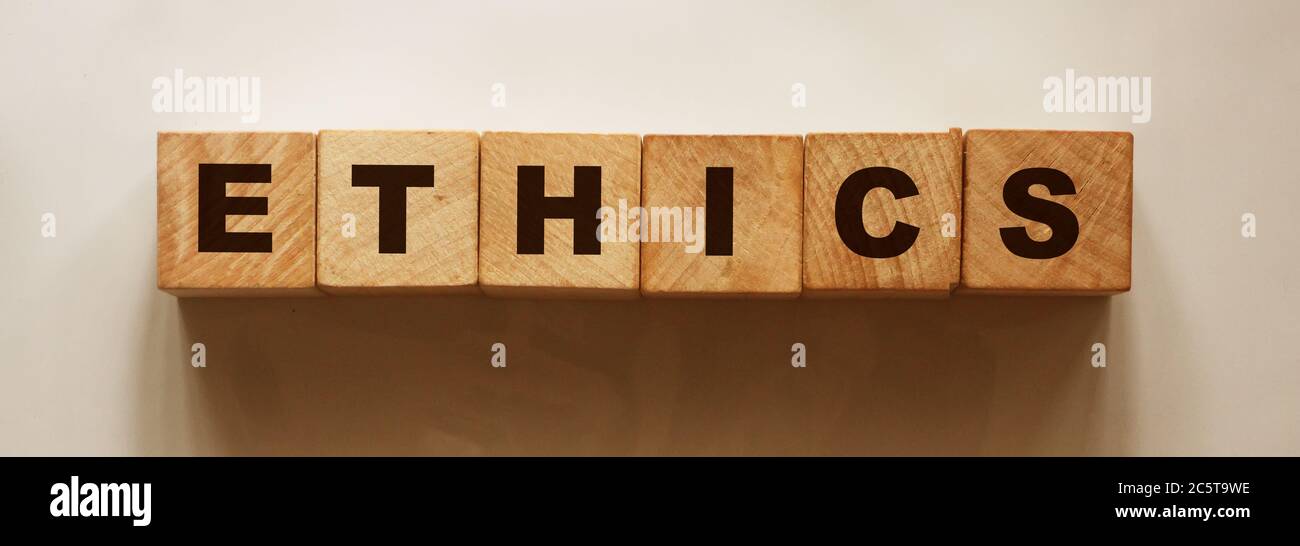 ETHICS word on wooden cubes. Social and business concept Stock Photo