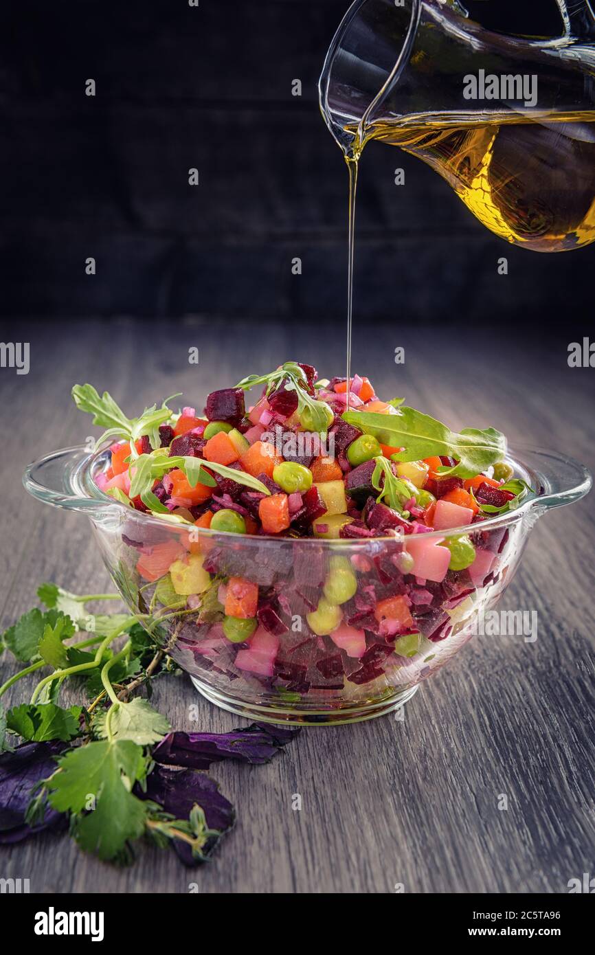 Traditional vegetarian Russian salad snack vinaigrette in a rustic recipe- Beet Salad.Dietary menu. Stock Photo