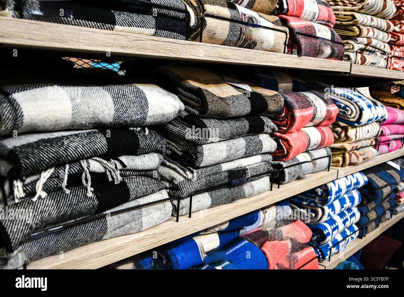 Stacked pile of different and colorful textile materials. Traditional