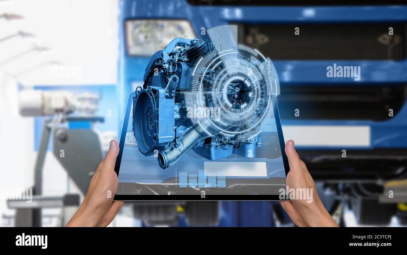 Repairing a truck with augmented reality Stock Photo
