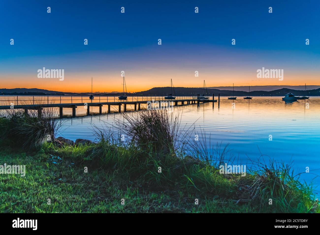 Capturing the sunrise from Couche Park at Koolewong Waterfront on the Central Coast, NSW, Australia. Stock Photo