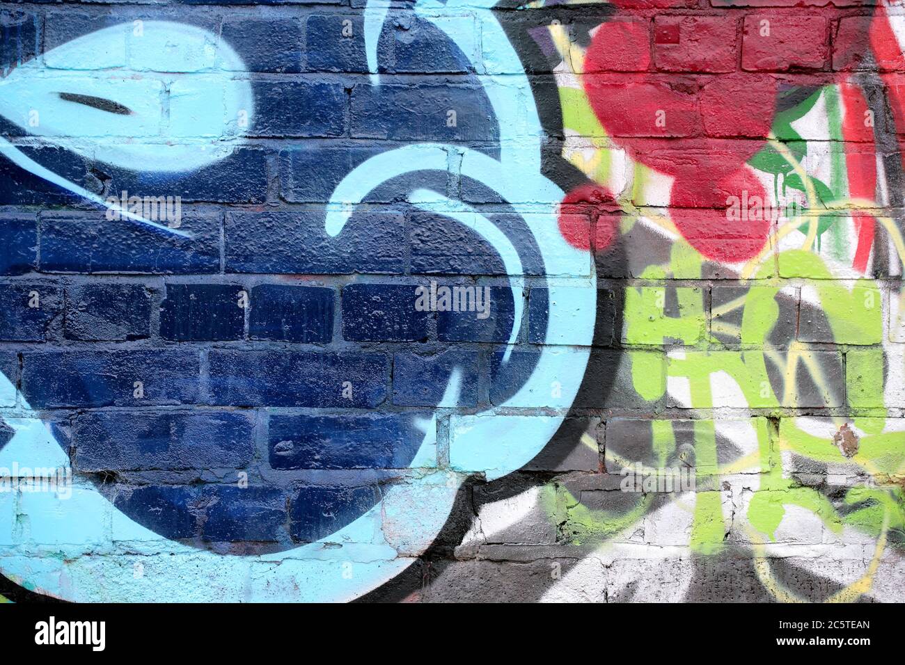 Footpath in Ordsall, along the now disused Manchester Ship Canal showing intensive graffiti activity Stock Photo