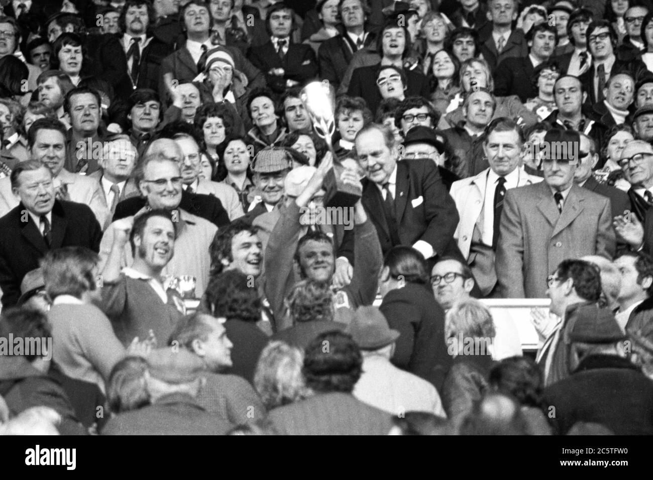 Llanelli captain Roy 'Shunto' Thomas holds the WRU Cup aloft after Llanelli defeated Aberavon by 12-10 in the WRU Cup Final held at the National Stadium, Cardiff on 27 April 1974. Stock Photo