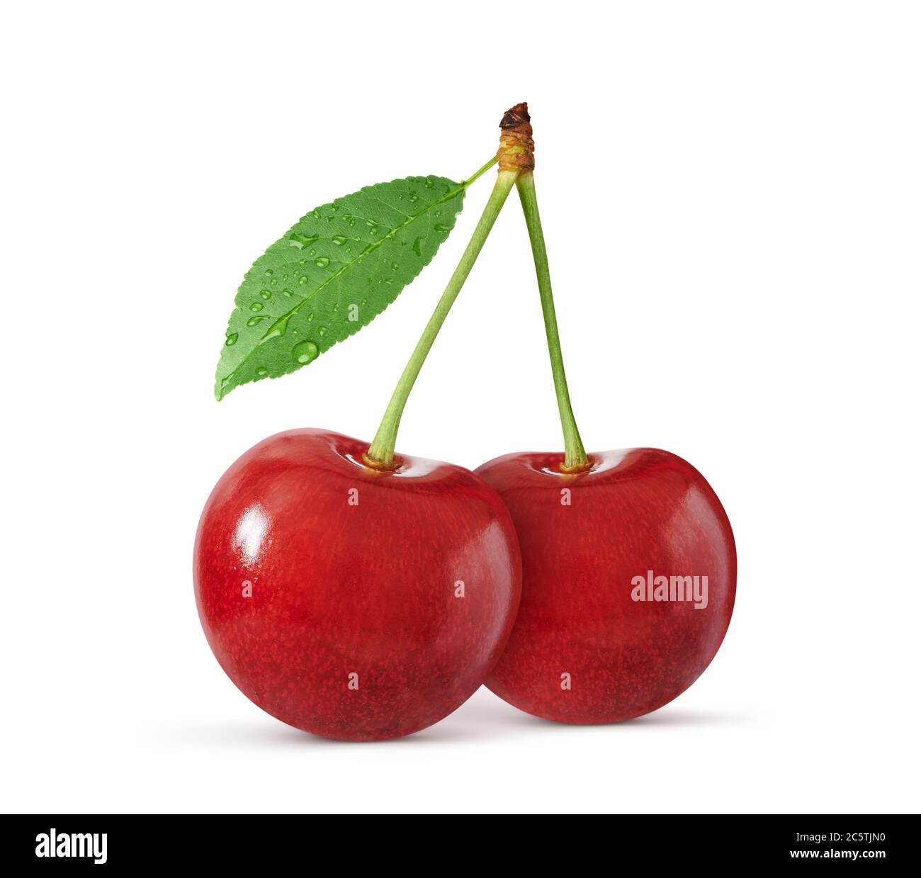Two cherries with leaf isolated on white background. Clipping path. Stock Photo