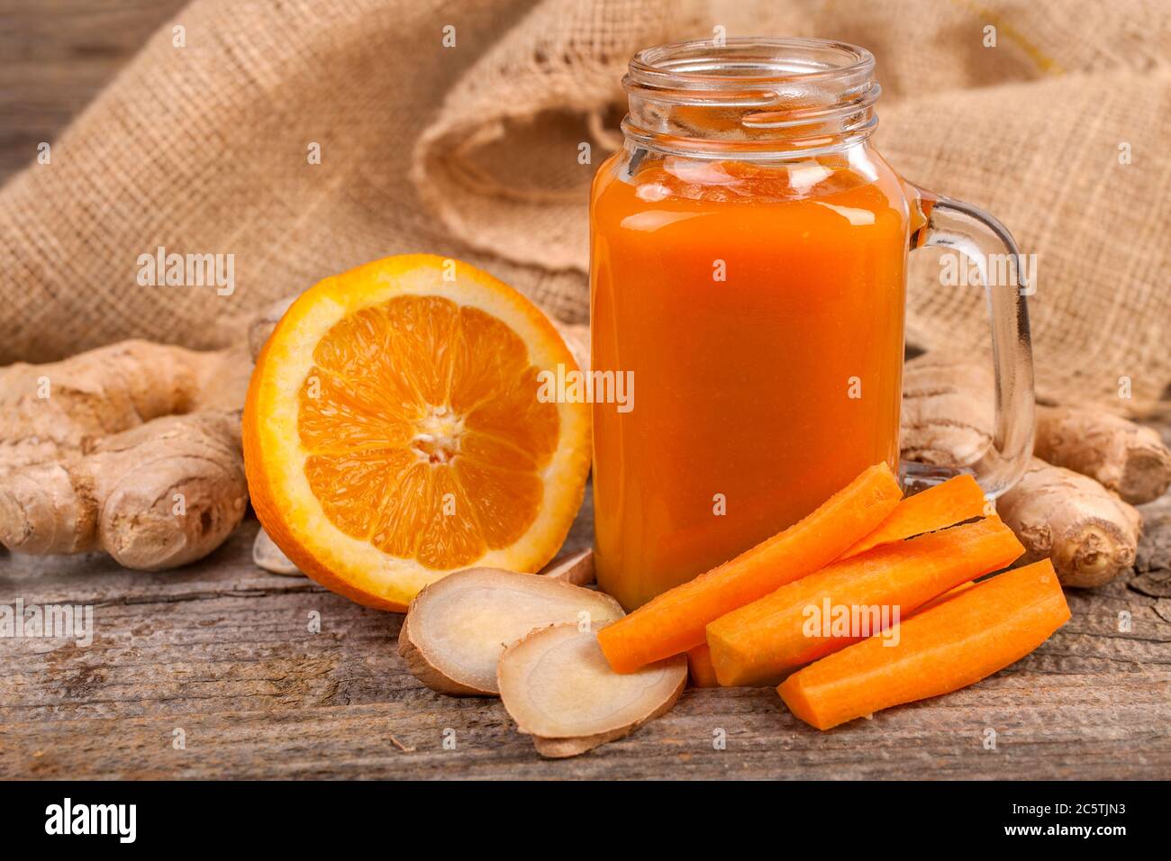 healthy orange juice with carrots and ginger Stock Photo Alamy