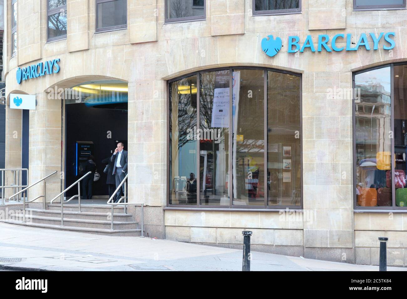 BIRMINGHAM, UK - APRIL 19, 2013: People visit Barclays Bank in Birmingham, UK. Barclays is a multinational finance and banking group based in London, Stock Photo