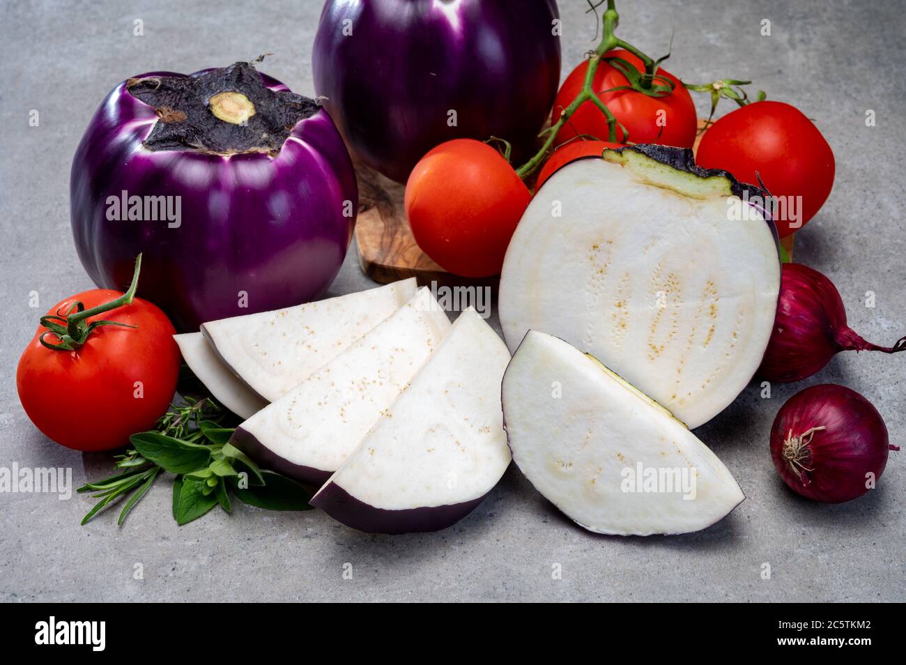 Fresh ripe sicilian purple globe eggplants vegetables ready to cook