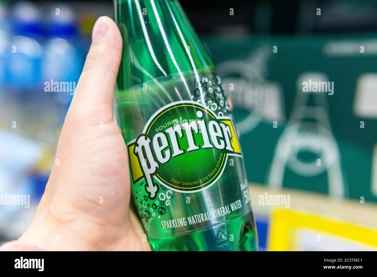Tyumen, Russia-June 09, 2020: mineral water bottles Perrier. French brand of premium mineral water. Selling in the hypermarket Stock Photo