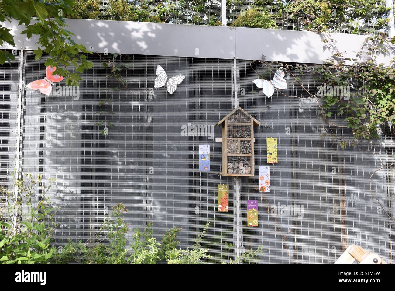 Cute insect hotel and wildlife area at MK1 Shopping Park, Milton Keynes. Stock Photo