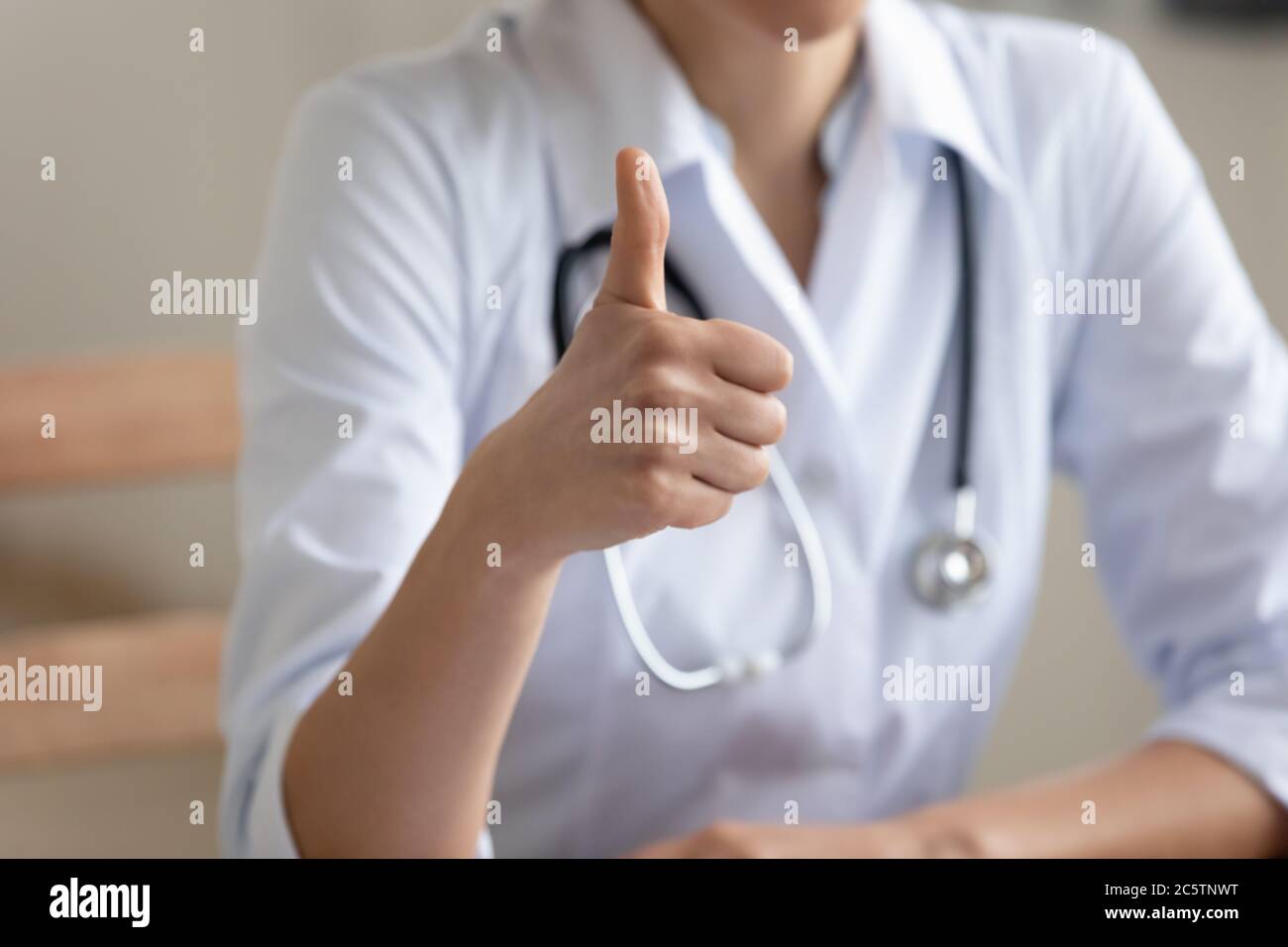 Close up of female doctor show thumb up Stock Photo Alamy