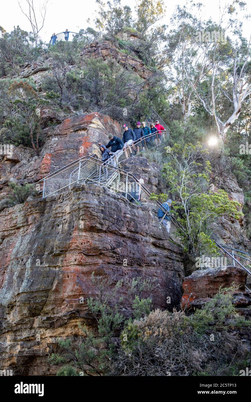 Giant stairway steps walk at katoomba in the blue mountains with hikers descending the 900 steps