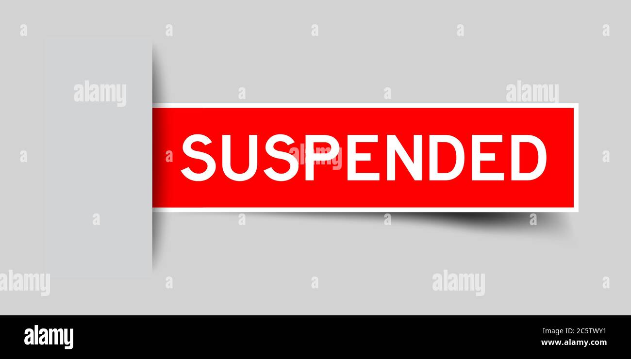 Inserted red color sticker label with word suspended on gray background ...
