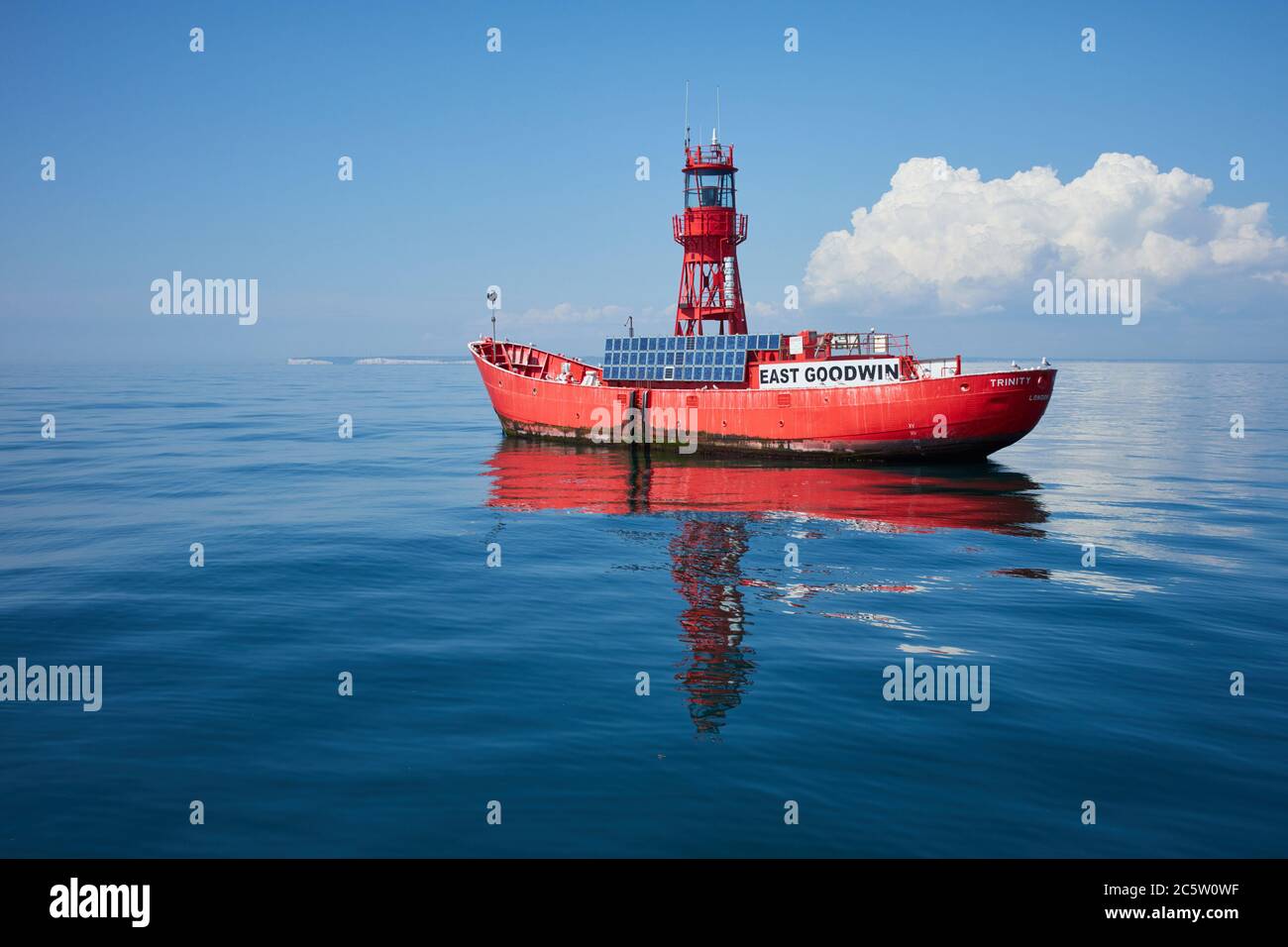 The East Goodwin Lightship, anchored near the Goodwin Sands, the great ship swallower, with the Kent coast and Dover beyond, UK Stock Photo