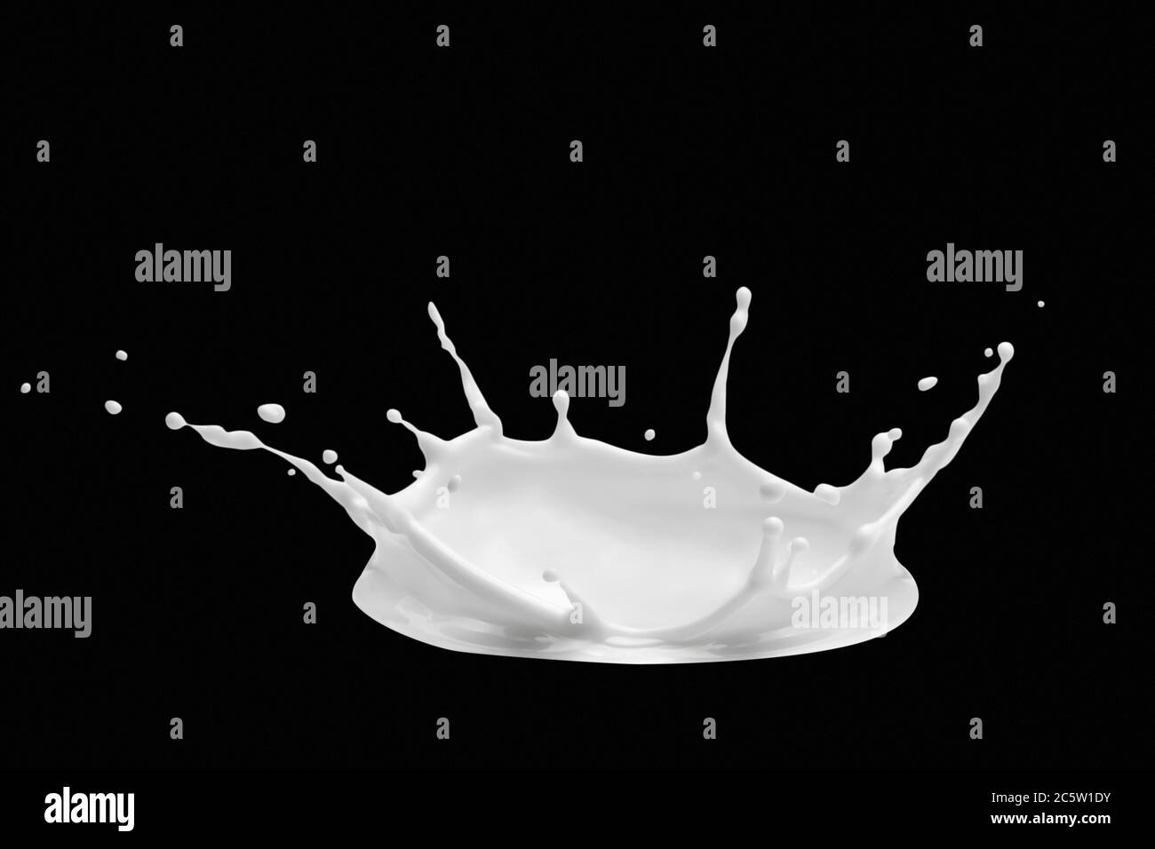 Splash Of Milk In The Form Of Milk Crown Milk Pouring Splash Isolated On Black Background Stock