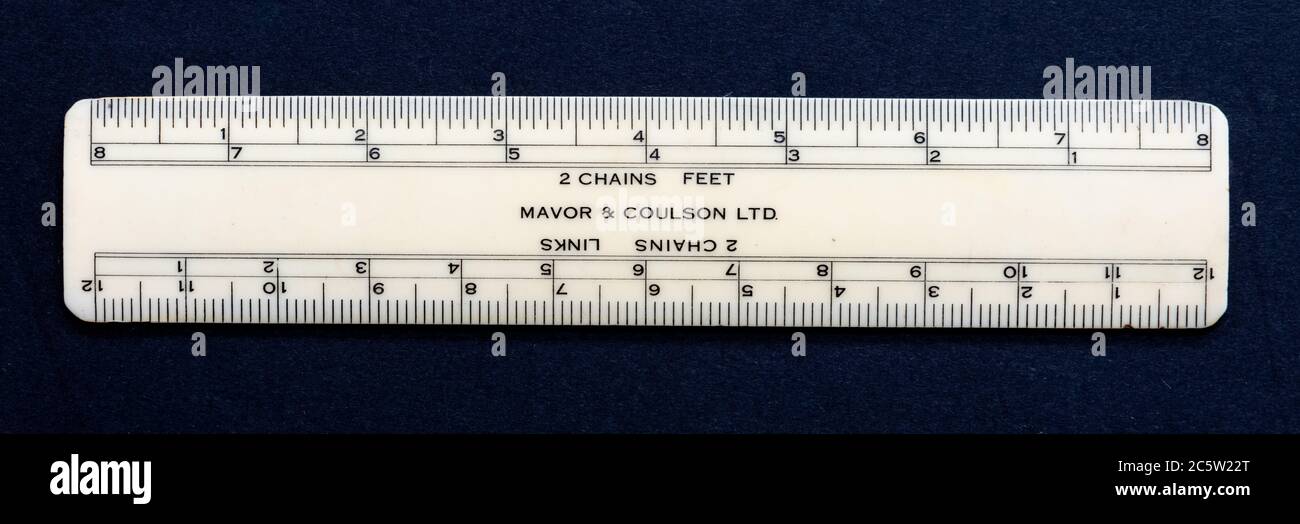 Mavor and Coulson Ltd scale ruler showing chains, feet and links image id 2C5W22T front 2C5W22K back - UK Stock Photo