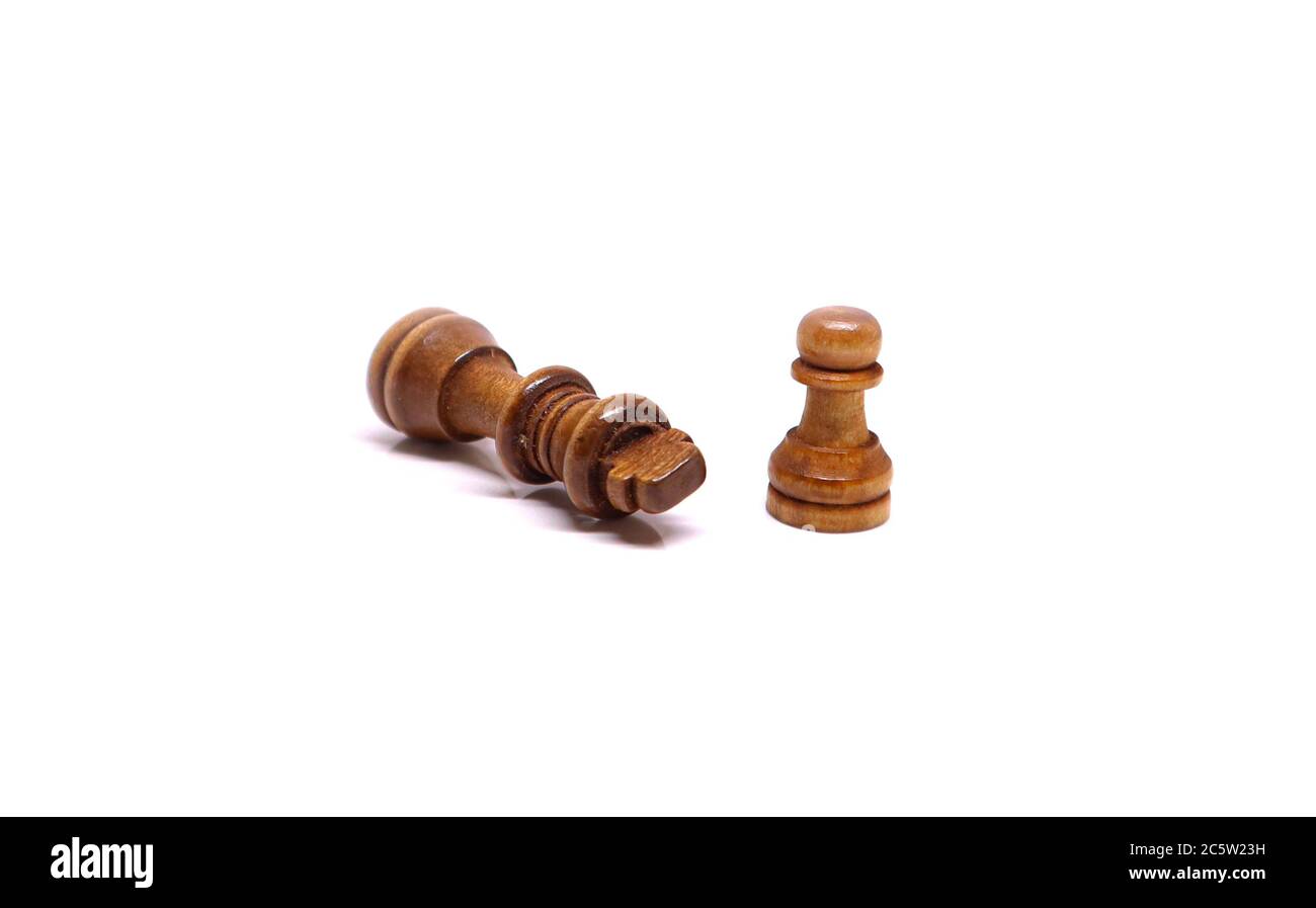 Chess coins - King down Stock Photo