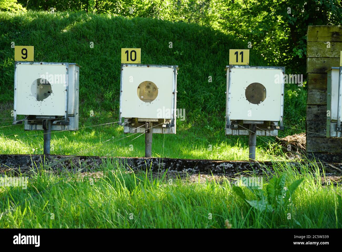 Part of targets in the row for fire arms in an outdoor target range in