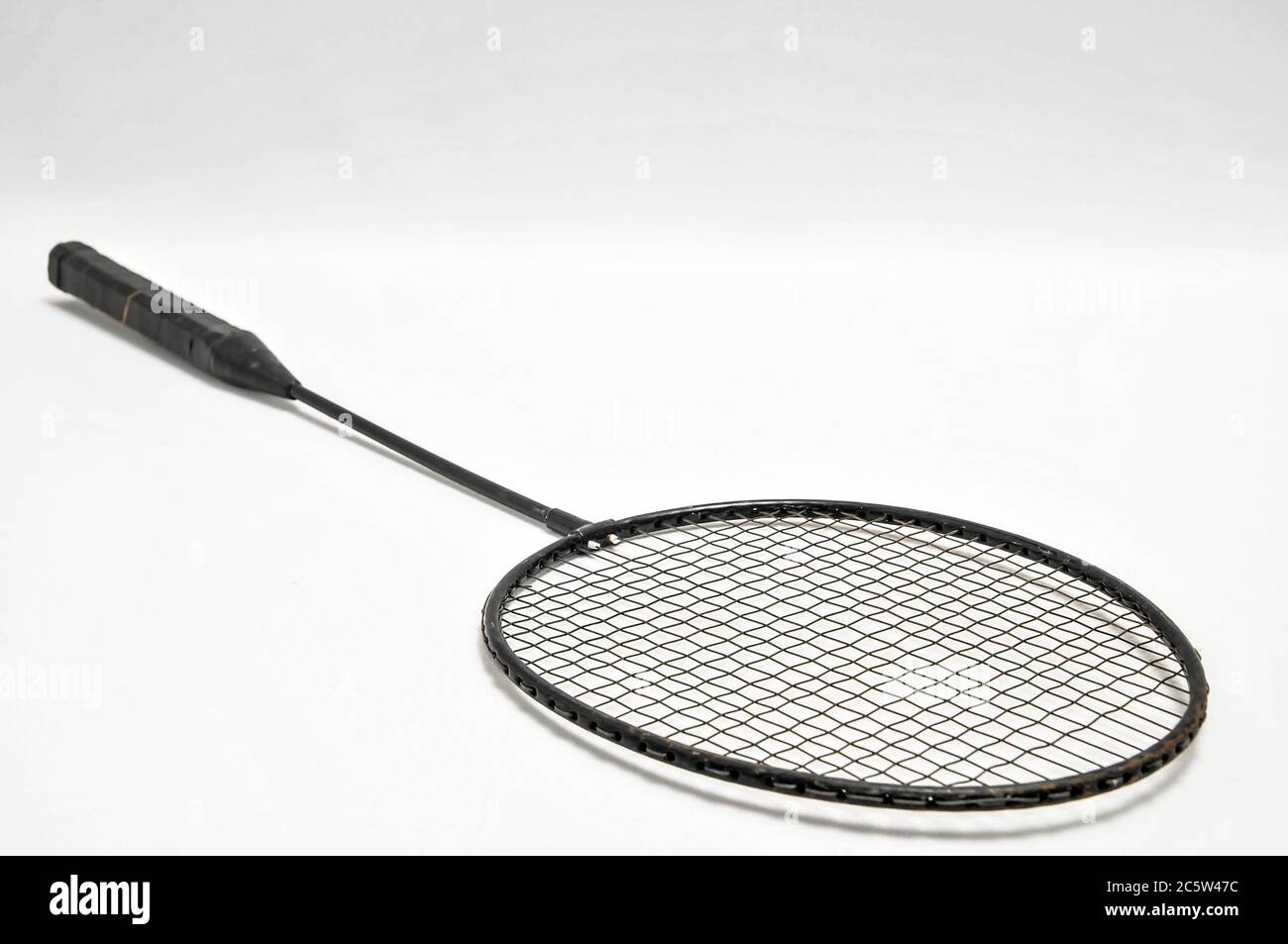 All Black Racket Vintage Old Used Black Racket on a White Background Stock Photo - Alamy