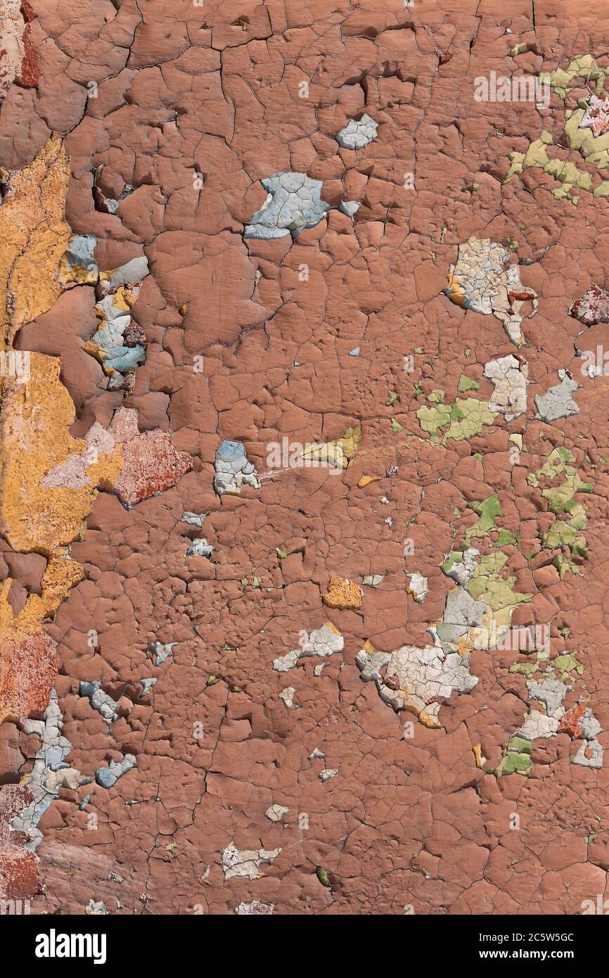 Old house wall with peeled paint Stock Photo