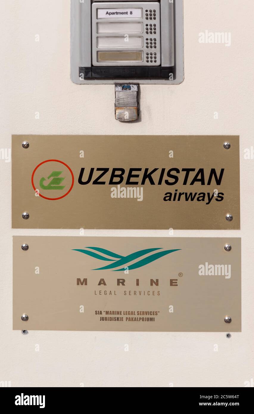 Signs Uzbekistan Airways and Marine Legal Services in Riga, Latvia Stock Photo