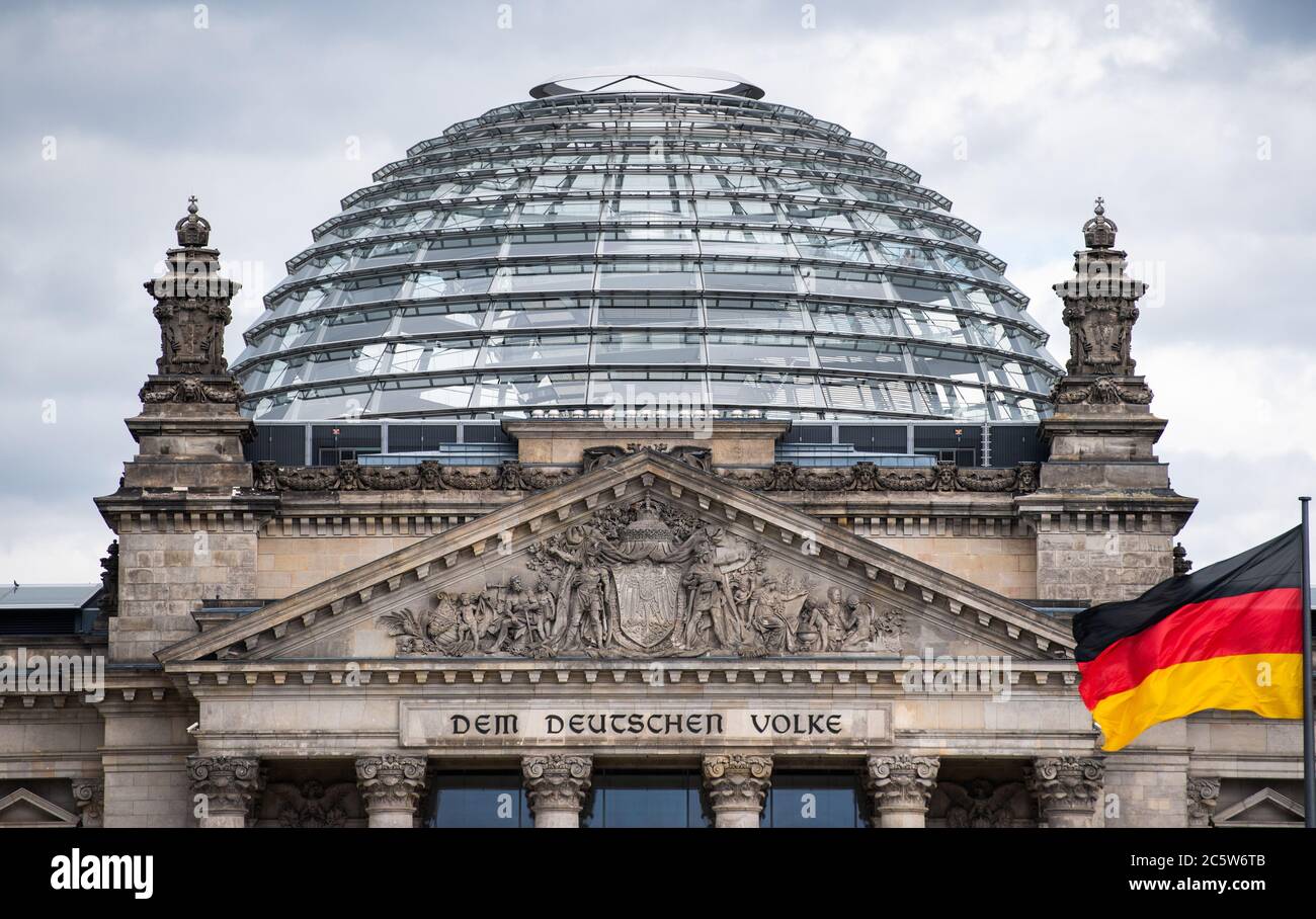 Berlin, Germany. 05th July, 2020. Clouds pass over the Reichstag building. Credit: Christophe Gateau/dpa/Alamy Live News Stock Photo