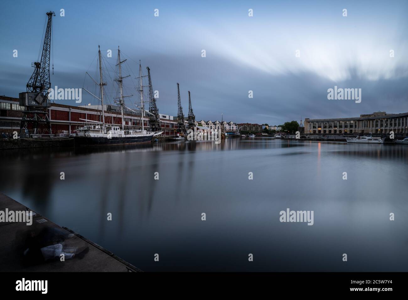 Historic boats including the tallship Lord Nelson are moored alongside the M Shed museum in Bristol's Floating Harbour. Stock Photo