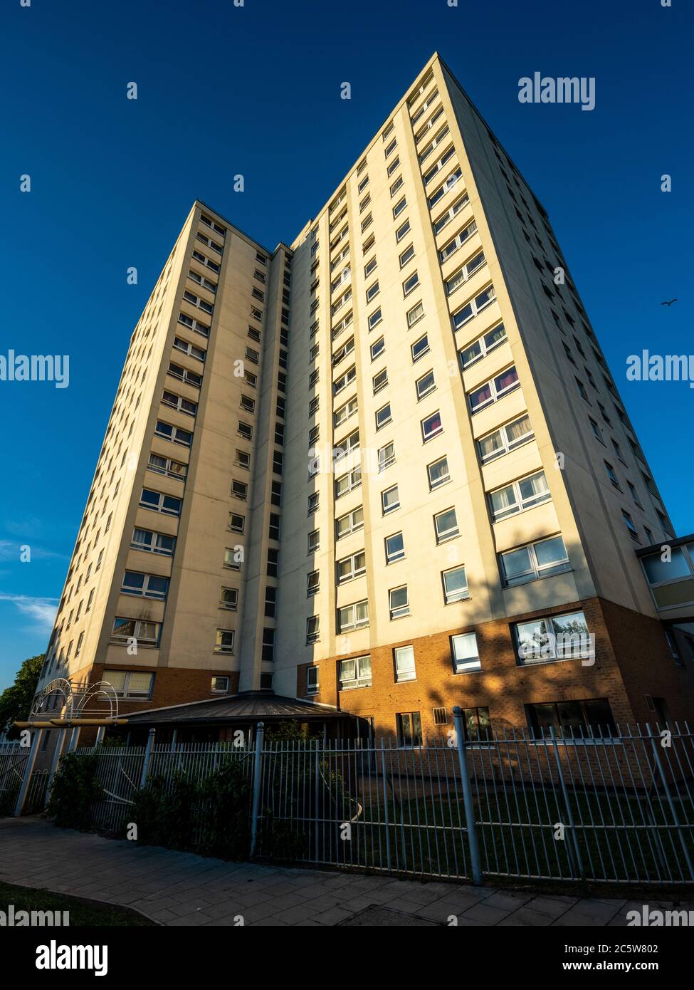 Evening sun shines on Lansdowne Court, one of the high rise tower block apartment buildings of the Lawrence Hill council estate in Bristol. Stock Photo