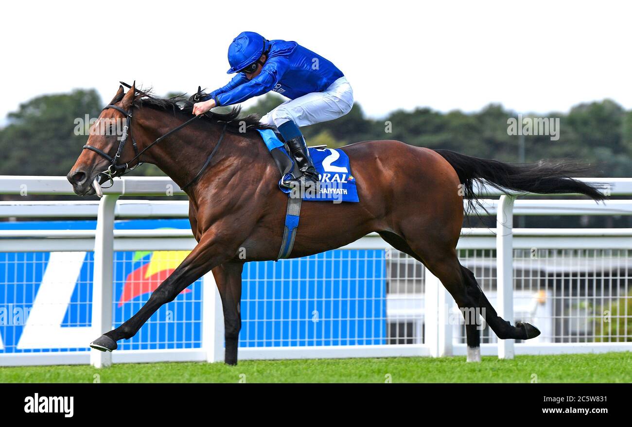 Ghaiyyath and jockey William Buick win the Coral-Eclipse at Sandown Park Racecourse. Stock Photo