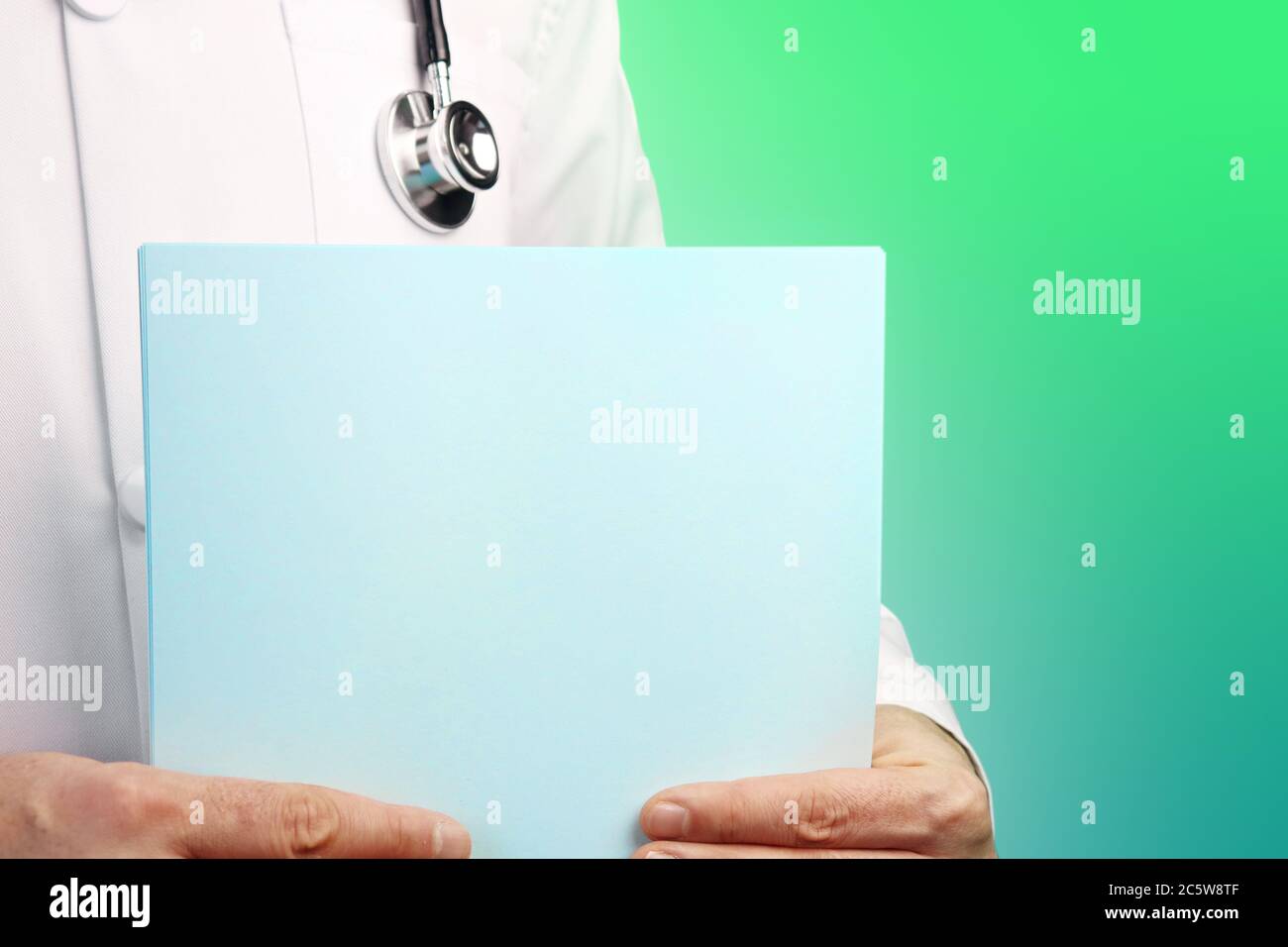 Download Male Doctor With Stethoscope Holds Medical Report In His Hands Cutout Green Turquoise Background Healthcare Medicine Mockup Stock Photo Alamy