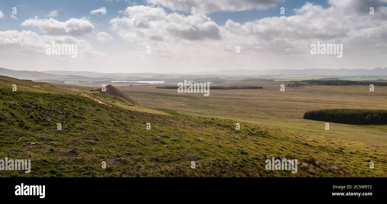 The Moorfoot and Pentland Hills rise around the moorland and farmland landscape of Midlothian in Scotland. Stock Photo